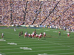 UCLA–USC rivalry football game at the Rose Bowl; the 2008 edition marked a return to the tradition of both teams wearing color jerseys.