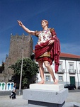 Augustus of Prima Porta (left: a painted reconstruction in Braga, Portugal; right: the marble original statue, c. 20 BC, 2.06 m in Vatican Museums in Italy).[42]