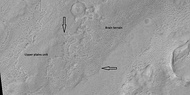 Brain terrain is forming from the breakdown of upper plains unit, as seen by HiRISE under HiWish program Arrow points to a place where fractures are forming that will turn into brain terrain.