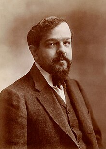 head and shoulders photograph of middle-aged, white, dark-haired, bearded man