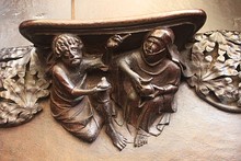 One of several misericords showing heads