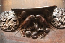 One of several misericords showing heads