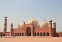 Short visual history of architectural styles (from left to right): the Ishtar Gate (Mesopotamian); the Temple of Isis from Philae (Ancient Egyptian); the Maison Carrée (Greco-Roman); the Kandariya Mahadeva Temple (Indian); the Hall of Prayer for Good Harvests of the Temple of Heaven (Chinese); the Basilica of San Vitale (Byzantine); Badshahi Mosque (Islamic); the Durham Cathedral (Romanesque); Sainte-Chapelle (Gothic); the Tempietto (Renaissance); Château de Maisons (Baroque); boiserie from the Hôtel de Varengeville (Rococo); the Petit Trianon (Neoclassical); Grand Central Terminal, Midtown Manhattan, New York City (Beaux-Arts); the Castel Béranger (Art Nouveau); the Théâtre des Champs-Élysées (Art Deco); the Fagus Factory (Modern); and the Neue Staatsgalerie (Postmodern)