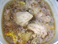 Southern Chinese-style chicken soup with mushrooms and corn pieces