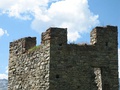 Crenellations on the top of the tower