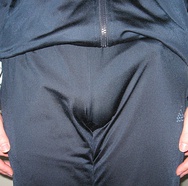 Erection visible beneath clothing