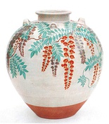 Traditional tapayan jar, used as a lawn ornament, water jar, or for bread baking, from the Philippines