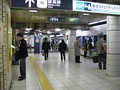 Row of ticket machines and fare table