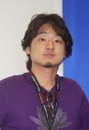 The game was directed and written by Shu Takumi (left) and produced by Atsushi Inaba (right).