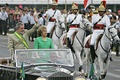 President Lula waves to the crowd with First Lady Marisa Letícia during the 2005 Independence Day military parade in Brasília