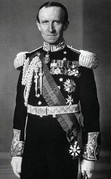 The Lord Tweedsmuir (left) was Governor General of Canada from 1935 to 1940;Sir Paulias Matane (right) was Governor-General of Papua New Guinea from 2004 to 2010