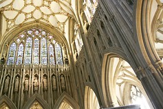 The Lady Chapel was probably designed by Thomas Witney, (1310–19). The windows have tracery of a regular net-like pattern and contain ancient stained glass.