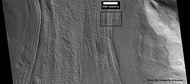 Context picture showing origin of next picture. The location is a region of lineated valley fill. Image from HiRISE under HiWish program.