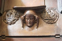 One of several misericords showing heads