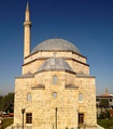 From top to bottom, left to right: The Sinan Pasha Mosque, the Roman Catholic Cathedral of Our Lady of Perpetual Succour, Gazi Mehmet Pasha Mosque, and the Serbian Orthodox Our Lady of Ljeviš church.