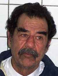 Saddam Hussein shortly after capture by American forces, and after being shaved to confirm his identity