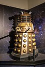 Various Dalek designs from throughout the series, including variants such as the Special Weapons Dalek and the Dalek Emperor.