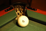 Russian pyramid ball at a corner pocket