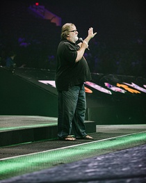 A man speaking into a microphone.