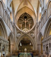 The horizontal line of the nave is emphasised by the unbroken galleries.