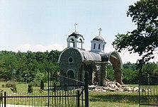 Left: Destroyed Serbian Orthodox Holy Trinity Church in Petrić villageRight: Ruins of a Serb part of Prizren destroyed during 2004 unrest in Kosovo.