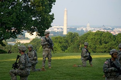 Soldiers with the 3rd US Infantry Regiment (The Old Guard) perform during the Twilight Tattoo at JB Myer–Henderson Hall.