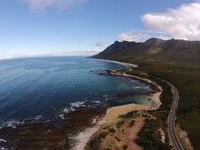 An aerial photograph of the R44 with a view of the Kogel Bay Resort is located between Gordon’s Bay and Rooi Els in the foreground.