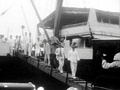 Seiei Matsui & Employees of Osaka Boeki Kaisha (Osaka Bazar) disembark in either Manila or Davao in the Philippines (May 1934). Matsui, the general manager, is second from front.