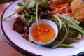 A small bowl of nước chấm (literally meaning, dipping water)