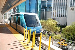 Metrorail (top) and Metromover are elevated modes of public transportation in Downtown Miami.