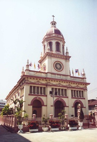 Portuguese coat of arms and sign – commending the property and hospital to Anthony of Lisbon – outside the Church of Sant'Antonio dei Portoghesi, Rome; the Portuguese presence in Europe outside of Portugal, has had many reasons such as economic, cultural and religious (up). Santa Cruz Church, Thon Buri District, Bangkok, Constructed by Portuguese monks in the 18th Century (down)