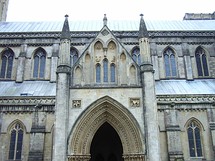 The north transept with its Medieval clock face, the north porch and north-west tower