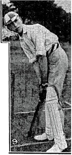 young man in cricket whites at the wicket