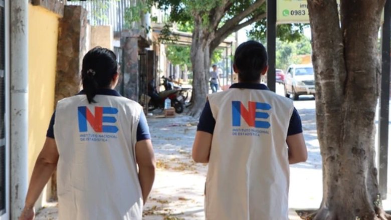 PARAGUAY-Two women with INE vests walking in the streets