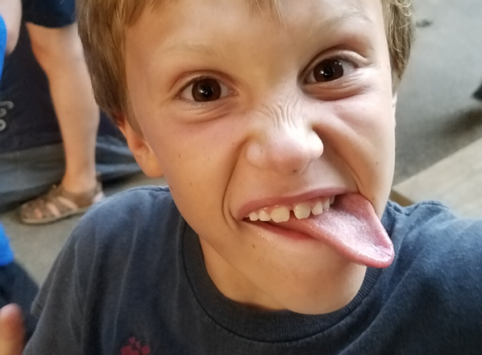 Kid with tongue out