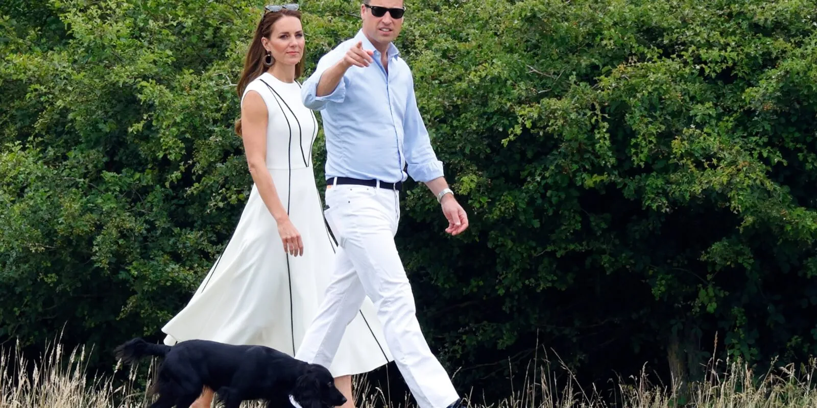 Prince William and Kate Middleton walk with with their dog Orla.