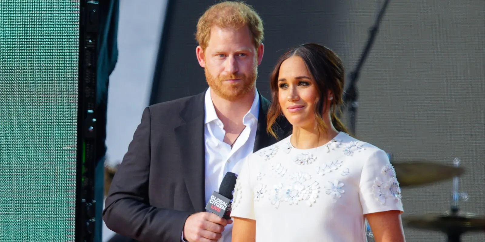 Prince Harry and Meghan Markle speak at an event in 2021