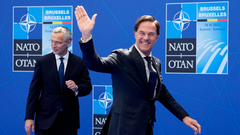 NATO Secretary General Jens Stoltenberg, left, greets Dutch Prime Minister Mark Rutte during arrivals for a NATO summit at NATO headquarters in Brussels, Monday, June 14, 2021. (AP Photo/Francois Mori, Pool, File)