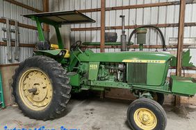 Stacey Lanoue's father, Jeff, had a John Deere 4020 with a serial number one off from her grandfather's.