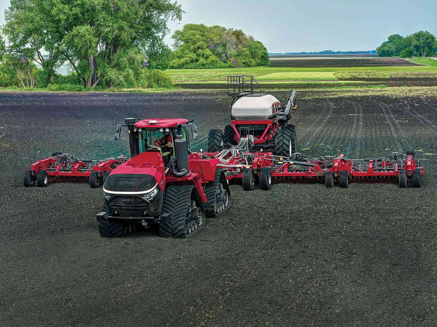 The Steiger 715 pulling an implement