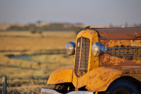 The rusted hood of a tractor on display at Aumann auctions.