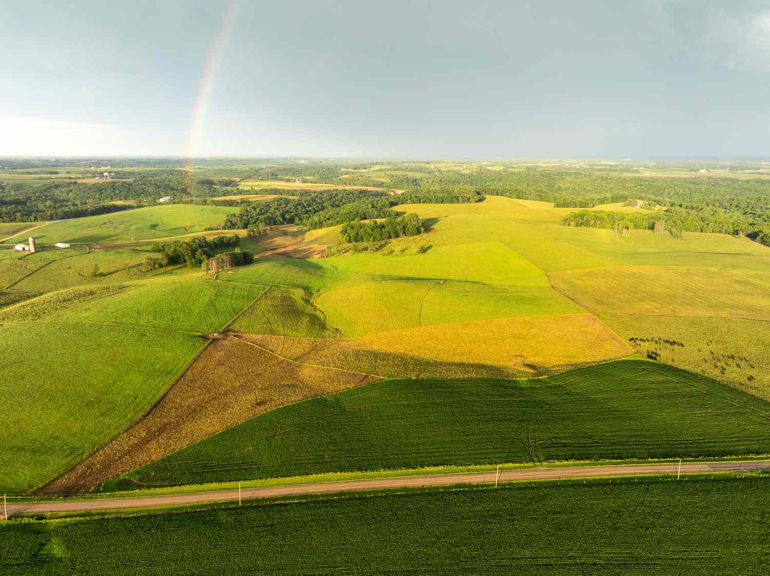 Farmland with a rainbox