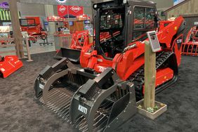 Kioti TL750 compact track loader with grapple attachment