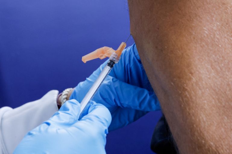 FILE PHOTO: A person receives an mpox vaccination at the Northwell Health Immediate Care Center at Fire Island-Cherry Grove, in New York, U.S., July 15, 2022. REUTERS/Eduardo Munoz/File Photo