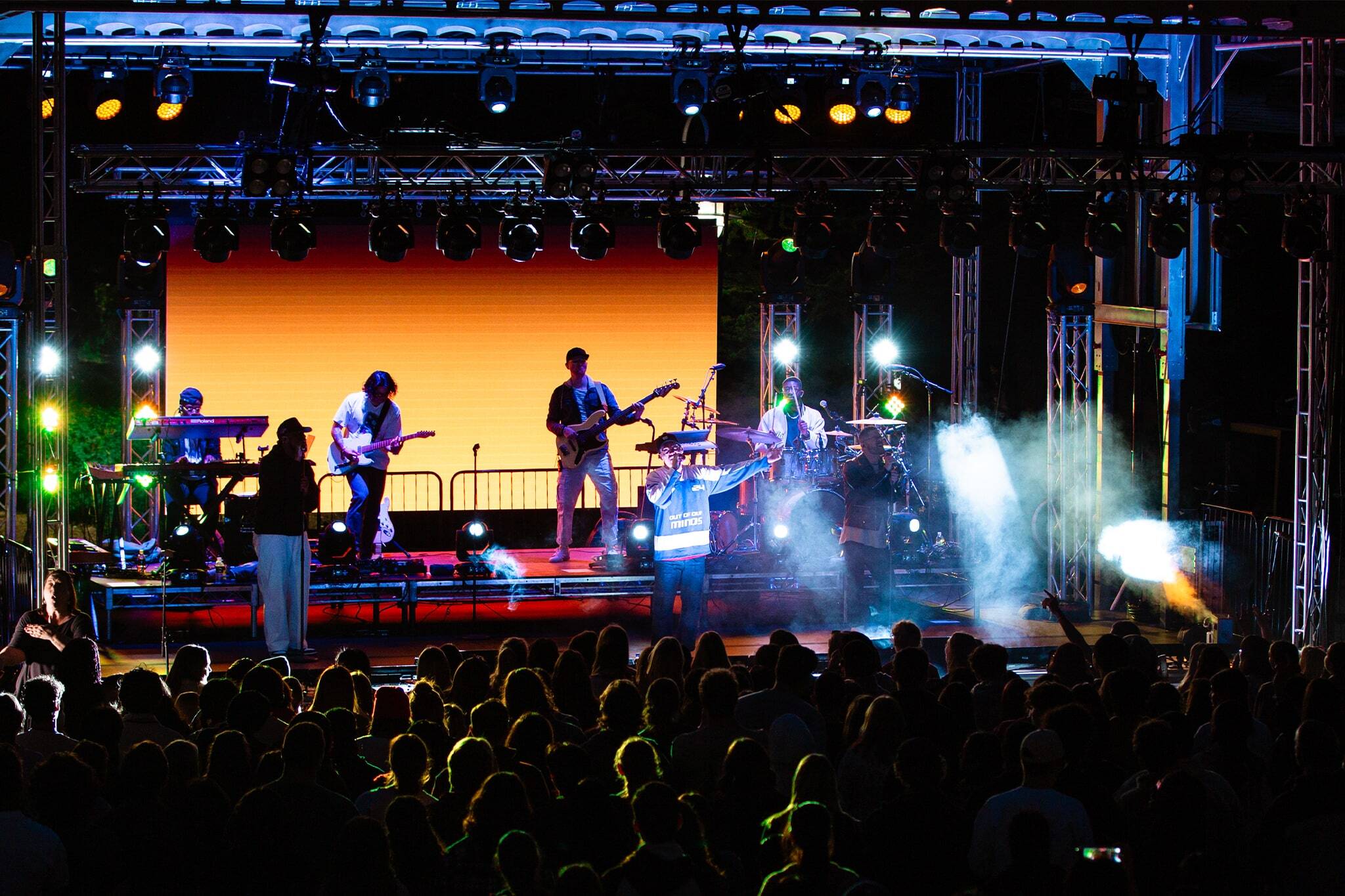 Student watching concert during night at the zu event