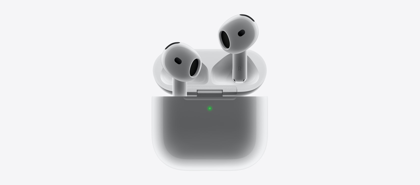 Os AirPods 4 sendo colocados dentro do estojo de recarga.