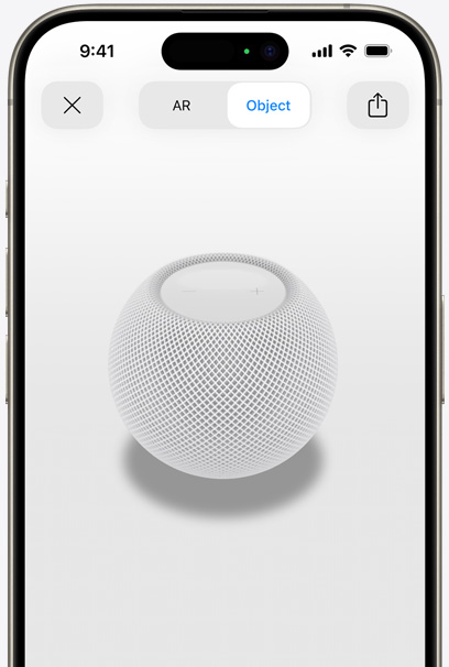 HomePod blanc en réalité augmentée sur l’écran d’un iPhone.