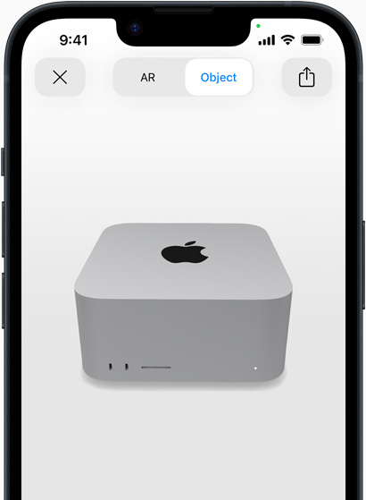 Un iPhone previsualizando un Mac Studio con realidad aumentada