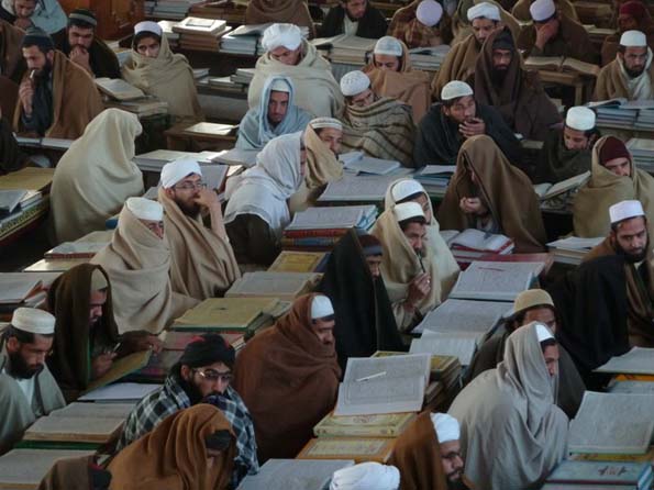 They listen intently as the Maulana emphasises the peaceful nature of Islam.