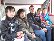 James Reynolds on train with Chinese migrant workers